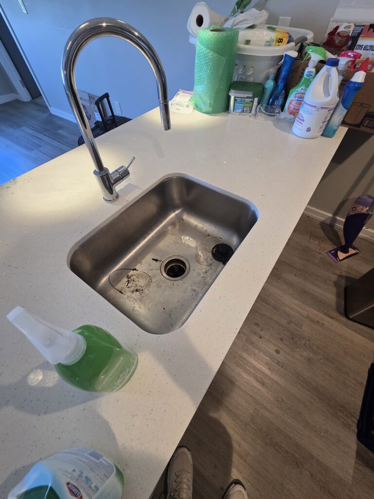Kitchen sink before deep cleaning